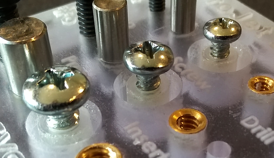 Fastening with Screws and Injection Molded Bosses